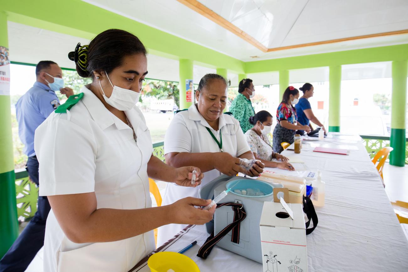 Nurses during measles vaccination