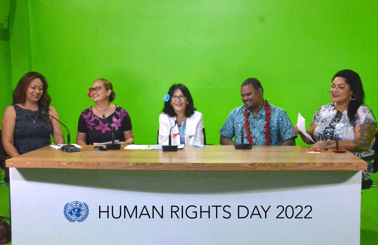 Panelists take a short break during the Human Rights Day panel discussion.