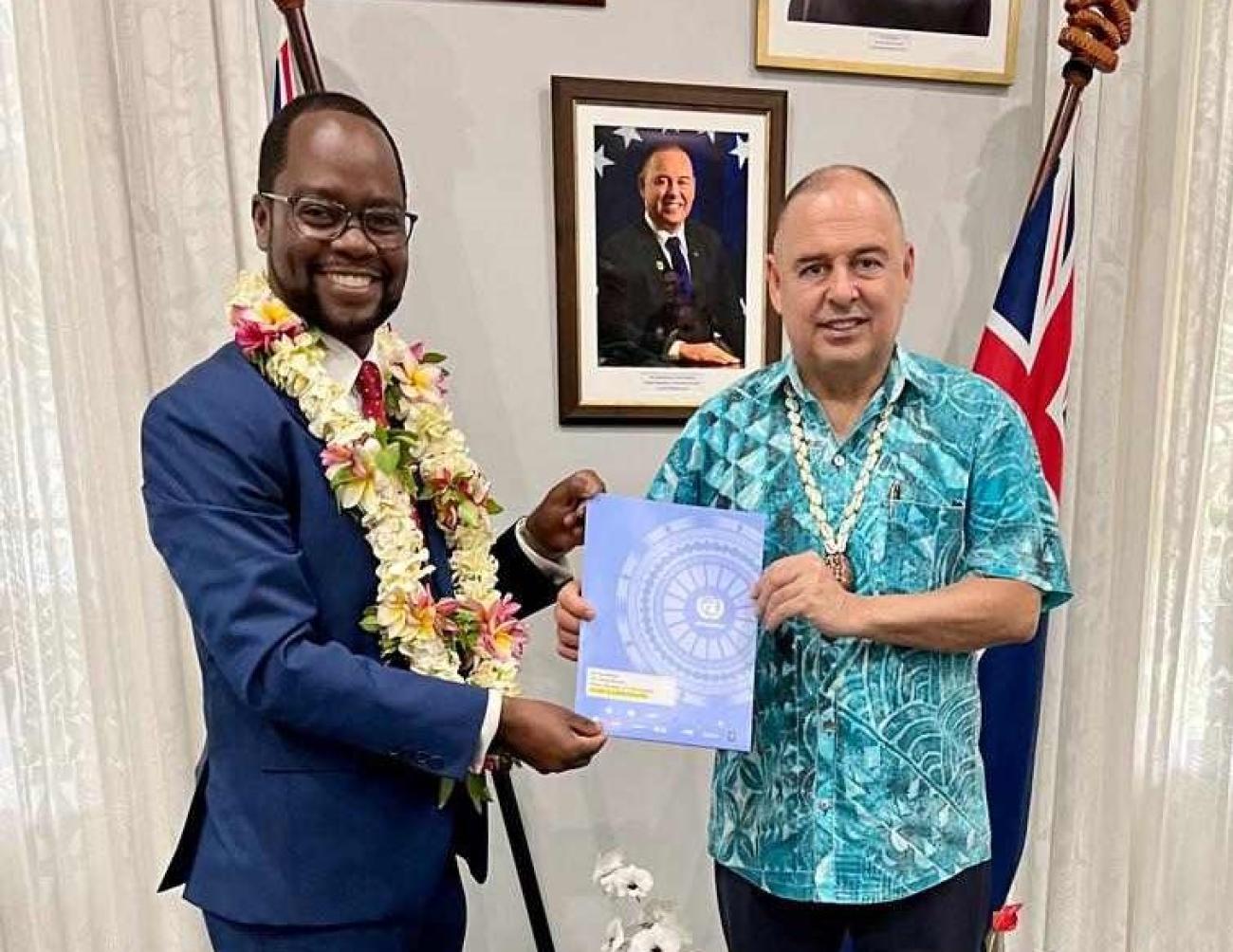 Two men holding a certificate